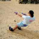 SLIDING DOWN THE BEACH